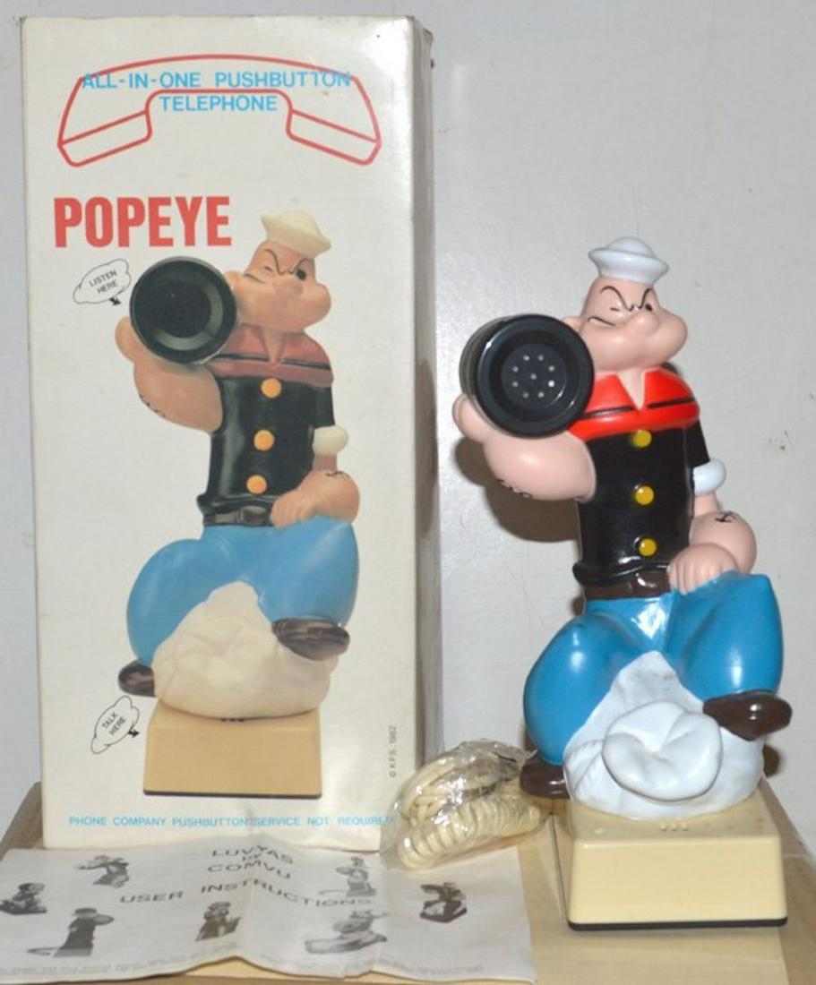 ALL IN ONE "POPEYE" PUSH BUTTON TELEPHONE: ALL IN ONE "POP EYE" PUSH BUTTON TELEPHONE. THIS UNIT IS HAND PAINTED. 1982.MINT IN BOX. COMPLETE AND INTACT