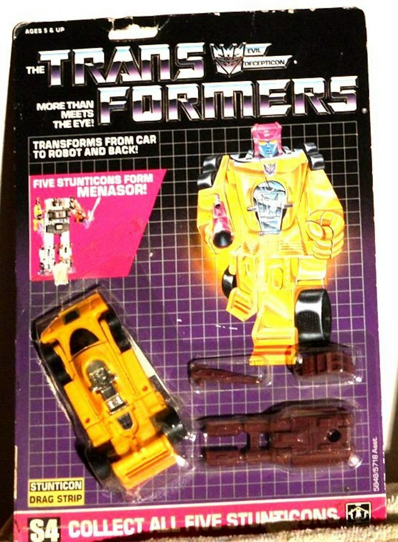 THE TRANSFORMERS "STUTICON DRAG STRIP": THE TRANSFORMERS "STUTICON DRAG STRIP"TRANSFORMS FROM CAR TO ROBOT AND BACK.FIVE STUNTICONS FORM MENASOR!COMPLETE AND INTACT