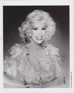 Joan Rivers - 8 x 10 Signed Photograph w/COA: Joan Rivers - 8 x 10 Signed Photograph w/COA. A black and white glossy photograph signed in felt tip ink by Joan Rivers. Bending in the photograph, but otherwise in good condition.