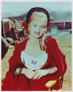 Debbie Reynolds - 8 x 10 Signed Photograph w/COA: Debbie Reynolds - 8 x 10 Signed Photograph w/COA. A color glossy photograph signed in black felt tip ink by Debbie Reynolds. In good condition.