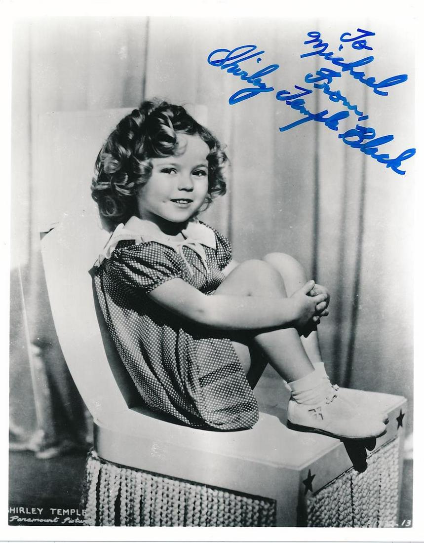 Shirley Temple Black- 8 x 10 Glossy signed photograph: Shirley Temple Black- 8 x 10 Glossy signed photograph w/COA. B&W Glossy photograph signed and inscribed in blue felt tip ink by Shirley Temple Black. In very good condition.