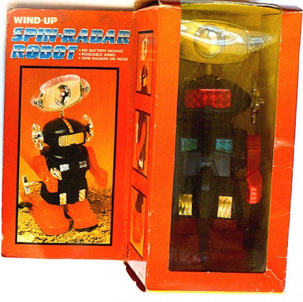 WIND UP SPIN-RADAR ROBOT: WIND UP SPIN-RADAR ROBOT.NO BATTERY IS NEEDED TO OPERATE. WIND UP ACTION.FEATURES POSEABLE ARMS, SPIN RADARS ON HEAD.MEASURES AT 8"THE BOX SHOWS SOME SHELF WEAR (SEE PICTURES)