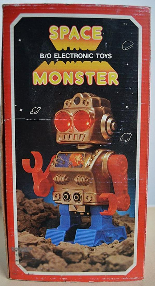 SPACE MONSTER W/ LITE UP EYES & ELECTRONIC SOUNDS: SPACE MONSTER W/ LITE UP EYES & ELECTRONIC SOUNDS. NO. 318. BY B/O ELECTRONIC TOYS. MADE IN HONG KONG. MINT IN BOX. COMPLETE AND INTACT. BOX MEASURES AT 10X5X5.