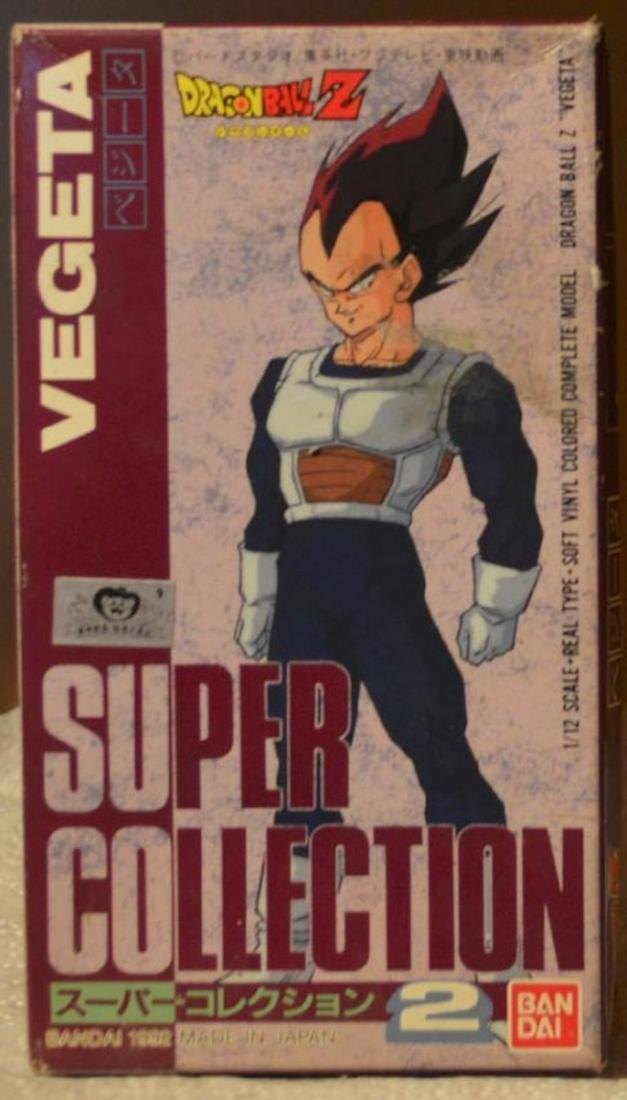 BANDAI DRAGON BALL Z VEGETA SUPER COLLECTION (CR): BANDAI DRAGON BALL Z VEGETA SUPER COLLECTION (CR). FIGURE HAS A 1/12 SCALE. REAL TYPE SOFT VINYL COLORED.MINT IN BOX. COMPLETE AND INTACT