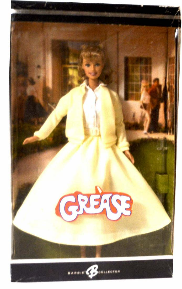 BARBIE "GREASE" DOLL: BARBIE "GREASE" DOLL. NEW. MINT IN A BOX (62)