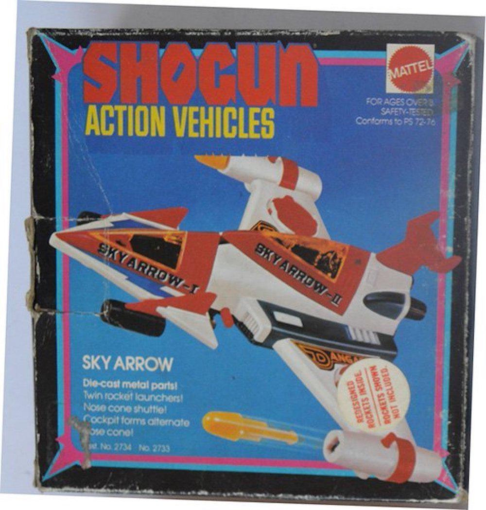 MATTEL SKY ARROW SHOGUN ACTION VEHICLE #3: MATTEL SKY ARROW SHOGUN ACTION VEHICLE #3.MADE OF DIE-CAST METAL PARTS.FEATURES: TWIN ROCKET LAUNCHERS, NOSE CONE SHUTTLE, COCKPIT FORMS ALTERNATE NOSE CONE.MEASURES AT 6".COMPLETE AND INTACT