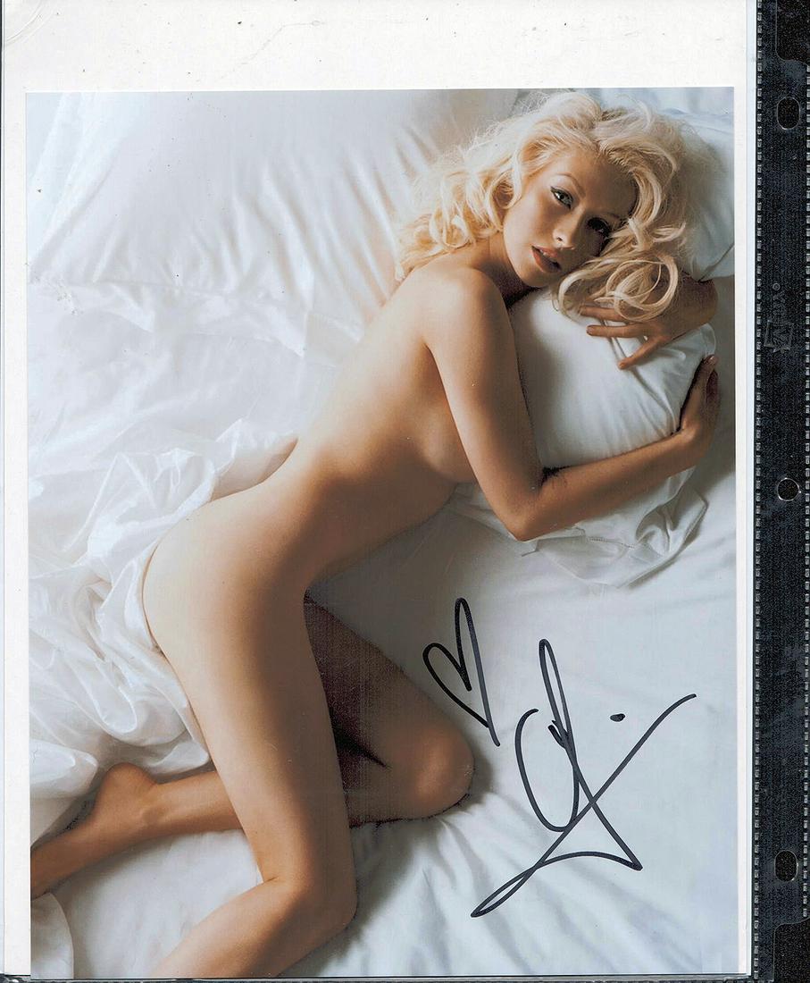 CHRISTINA AGUILERA - 8 X 10 SIGNED PHOTOGRAPH W/COA: CHRISTINA AGUILERA - 8 X 10 SIGNED PHOTOGRAPH W/COA. SIGNED PHOTOGRAPH BY CHRISTINA AGUILERA. COMES WITH COA FROM TODD MUELLER AUTOGRAPHS