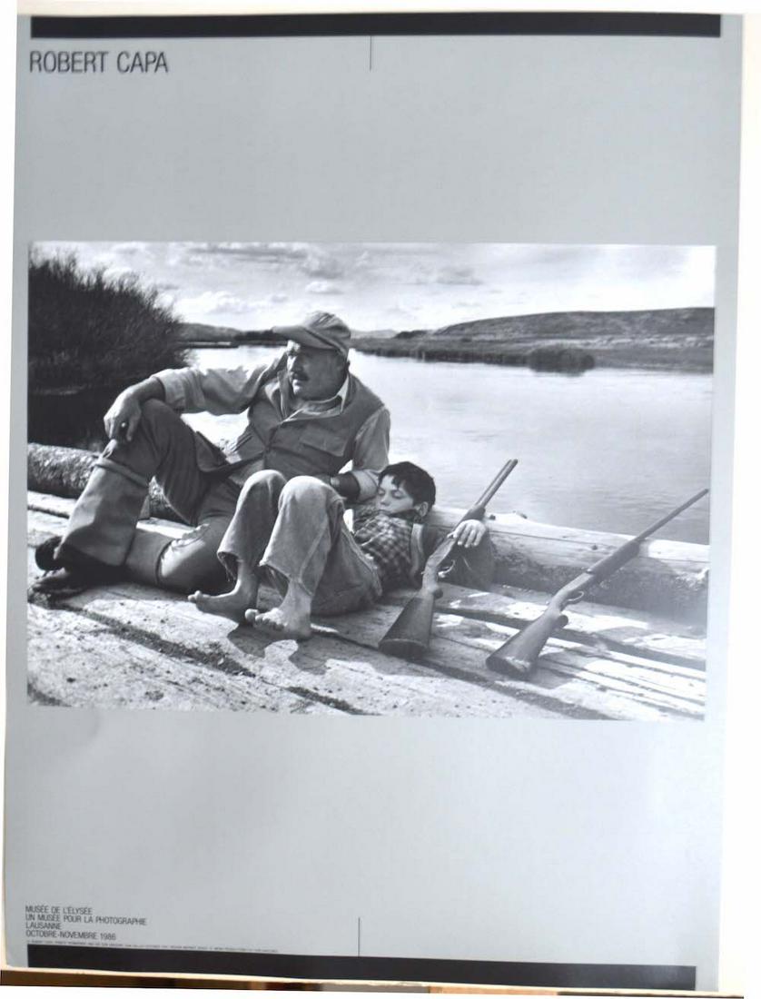 ROBERT CAPA - "ERNEST HEMINGWAY AND HIS SON GREGORY": ROBERT CAPA - "ERNEST HEMINGWAY AND HIS SON GREGORY", 1986, 18 X 24, GOOD CONDITION