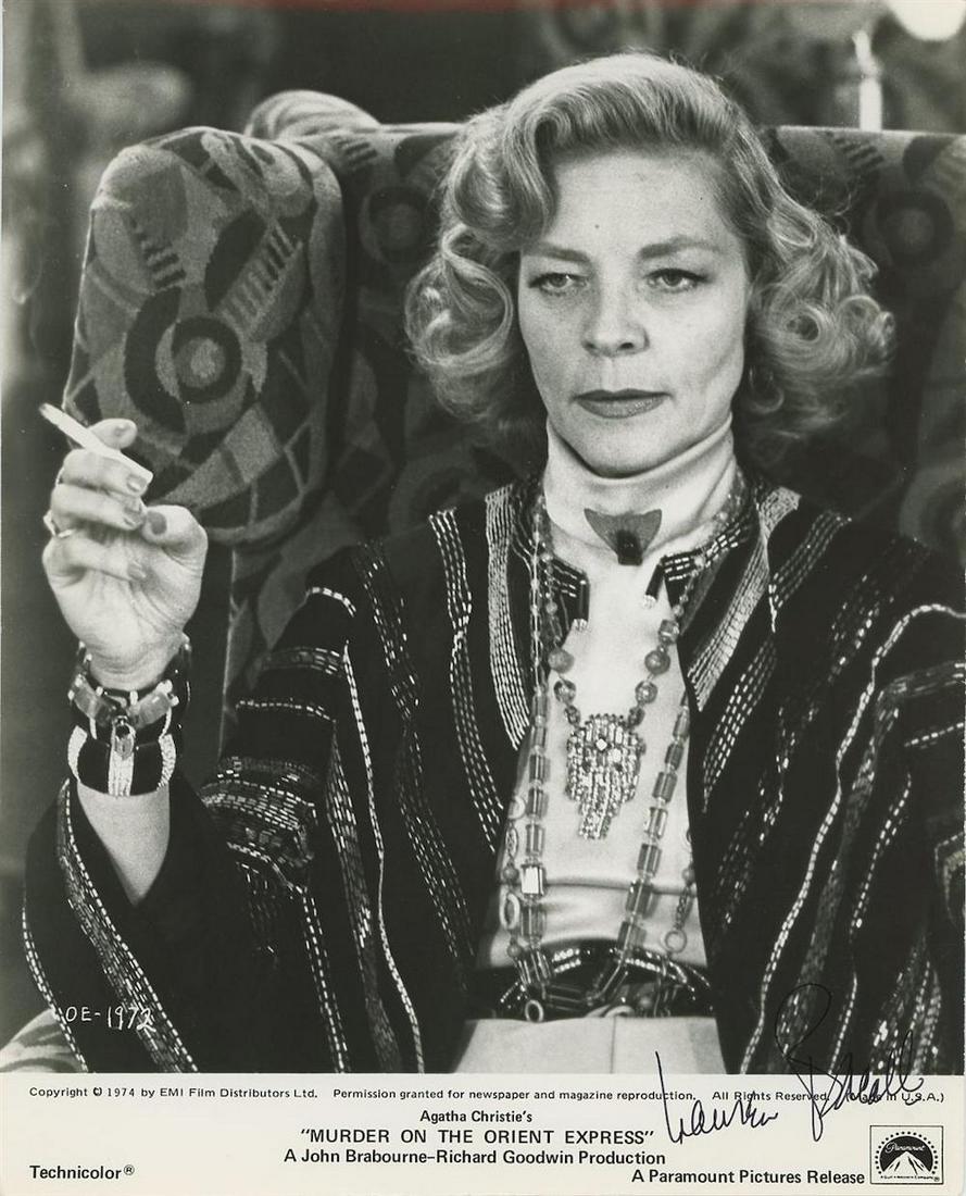 Lauren Bacall- Signed Photograph 8 X 10 (Murder on the Orient Express) W/COA: Lauren Bacall- Signed Photograph 8 X 10 (Murder on the Orient Express) W/COA. 8x10 B&W glossy finish photograph from, "Murder on the Orient Express", signed in black felt tip ink by Lauren Bacall. Som