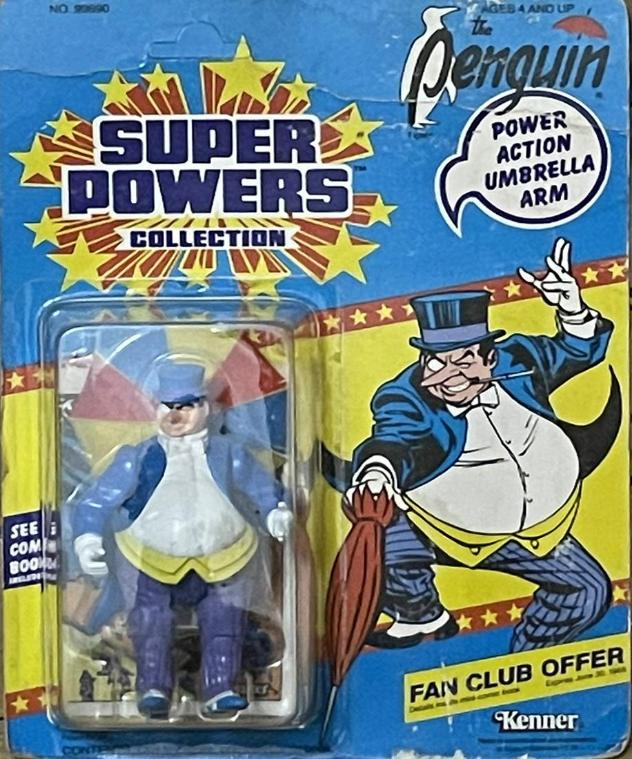 SUPER POWERS "THE PENGUIN" ACTION FIGURINE ON CARD: SUPER POWERS "THE PENGUIN" ACTION FIGURINE ON CARD. PART OF SUPER POWERS COLLECTION. NEW AND NEVER USED. THE CARD IS "UN-PUNCHED." IT SHOWS SOME AGING. IT HAS DENTED LINE RUNNING ACROSS THE TOP OF CAR