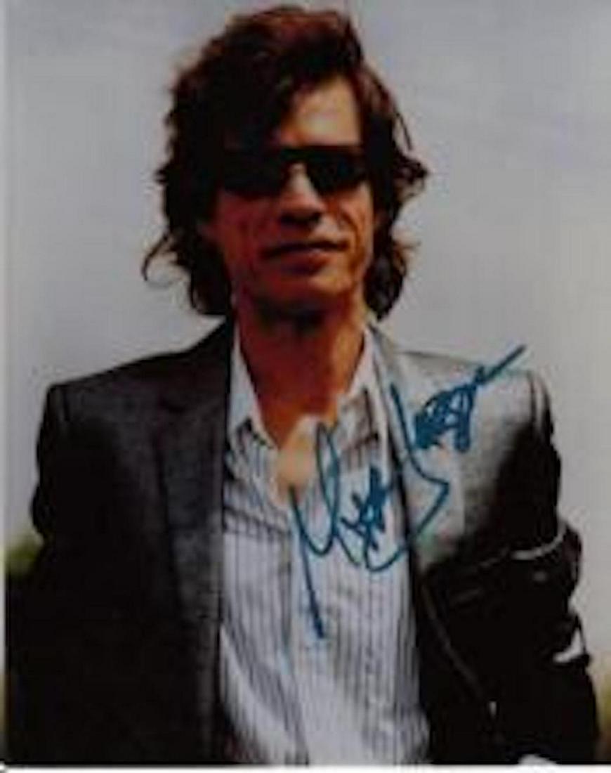 MICK JAGGER AUTHENTIC SIGNED 8 X 10 PHOTOGRAPH #2: MICK JAGGER AUTHENTIC SIGNED 8 X 10 PHOTOGRAPH #2. THIS ITEM HAS BEEN INSPECTED AND AUTHENTICALLY VERIFIED BY ENCORE AUTOGRAPHS. IT IS NOT A COPY, REPRINT, OR ANY KIND OF FACSIMILE OF THE ARTIST'S AUT