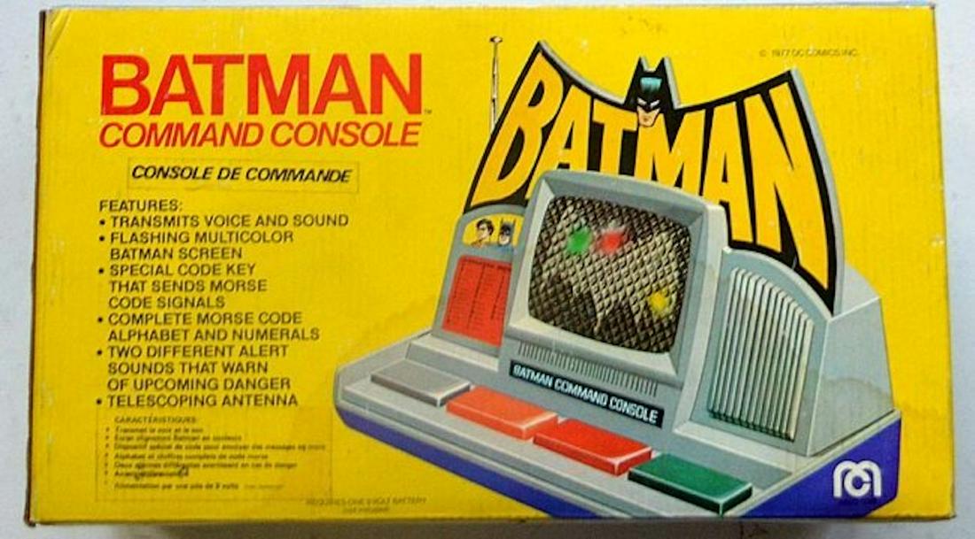 BATMAN COMMAND CONSOLE: BATMAN COMMAND CONSOLE.FEATURES: TRANSMITS VOICE AND SOUND, FLASHING MULTICOLOR BATMAN SCREEN, SPECIAL CODE KEY, ETC. MINT IN BOX. COMPLETE AND INTACT. BOX MEASURES AT 13X5X5