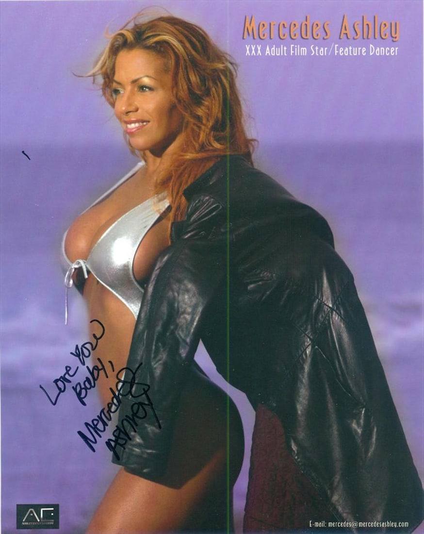 Mercedes Ashley - 8 x 10 Signed Photograph w/COA: Mercedes Ashley - 8 x 10 Signed Photograph w/COA. A signed color paper stock photograph signed in black felt tip ink by Mercedes Ashley. Comes with COA