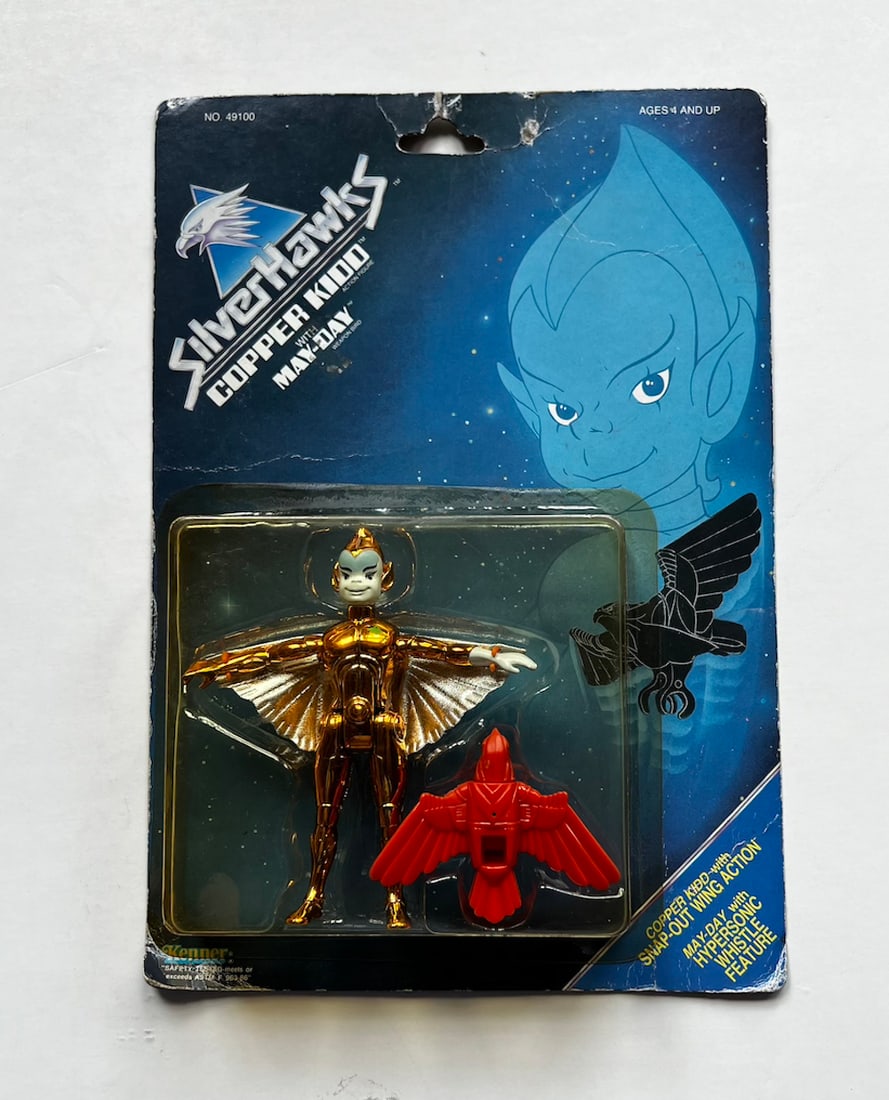 Silver Hawks - Copper Kidd / May-Day Action Figure on Card: Silver Hawks - Copper Kidd / May-Day Action Figure on Card. Card is punched on the top with a small teared (see pic). The plastic enclosure is intact. New and unused