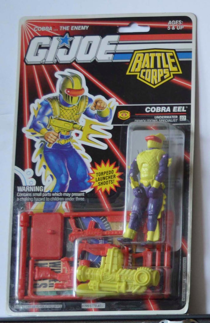 G.I. JOE "COBRA EEL" BATTLE CORPS FIGURE ON CARD: G.I. JOE "COBRA EEL" UNDERWATER DEMOLITIONS SPECIALIST. BATTLE CORPS FIGURE ON CARD. 1992. MINT CONDITION