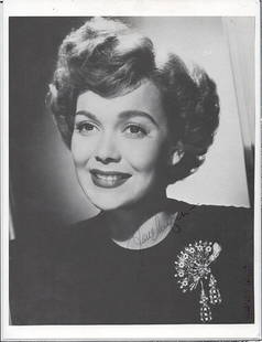 JANE WYMAN SIGNED 8 X 10 PHOTOGRAPH: JANE WYMAN SIGNED 8 X 10 BLACK AND WHITE BOOK PHOTOGRAPH. SIGNED BY JANE WYMAN IN BLACK BALL POINT INK. CERTIFICATE OF AUTHENTICITY IS GUARANTEED BY TODD MUELLER AUTOGRAPHS.