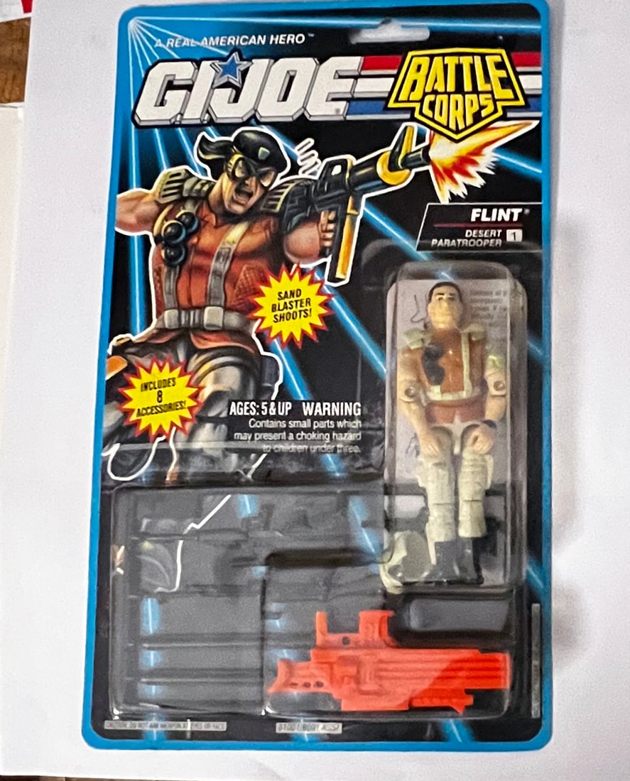 G.I. JOE "FLINT" BATTLE CORPS FIGURE ON CARD: G.I. JOE "FLINT" DESERT PARATROOPER. BATTLE CORPS FIGURE ON CARD. 1994. MINT CONDITION ON CARD (MOC)