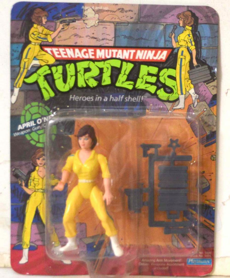 TEENAGE M.N.T. "APRIL O'NEIL, WEAPON GUN/CAMCORDER": TEENAGE M.N.T. "APRIL O'NEIL, WEAPON GUN/CAMCORDER" ACTION FIGURINE ON CARD. NEW. THE CARD IS "UN-PUNCHED." THE CARD SHOWS SOME AGING. THE FIGURINE IS IN MINT CONDITION.