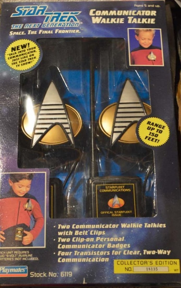 STAR TREK THE NEXT GENERATION WALKIE TALKIE (CR): STAR TREK THE NEXT GENERATION COMMUNICATION WALKIE TALKIE (CR). BOX INCLUDES TWO WALKIE TALKIE WITH BELT CLIPS, TWO CLIP ON PERSONAL BADGES, FOUR TRANSISTORS FOR CLEAR TWO-WAY COMMUNICATION. COMMUNICA