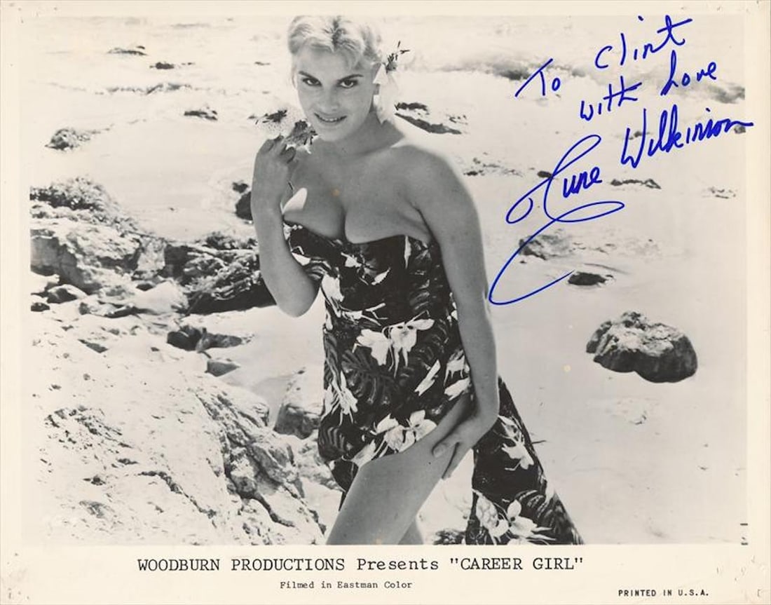 June Wilkinson- Vintage Glossy signed 10 x 8 photograph: June Wilkinson- Vintage Glossy signed 10 x 8 photograph w/COA. B&W Glossy vintage photograph signed and inscribed in blue felt tip ink by June Wilkinson. Pin holes to the corners, thus the low minimum