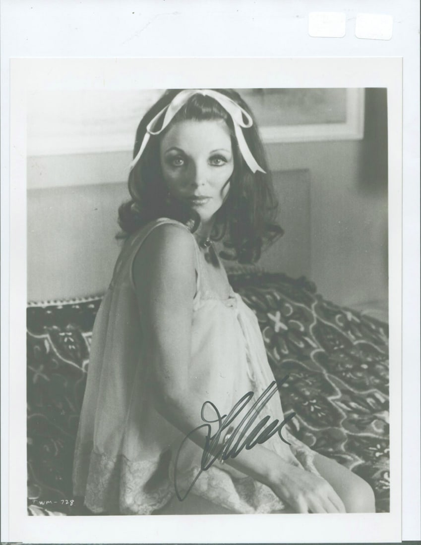 Joan Collins - 8 x 10 Signed photograph: Joan Collins - 8 x 10 Signed photograph. A signed B/W photograph by Joan Collins. Comes with COA from Todd Mueller Autographs