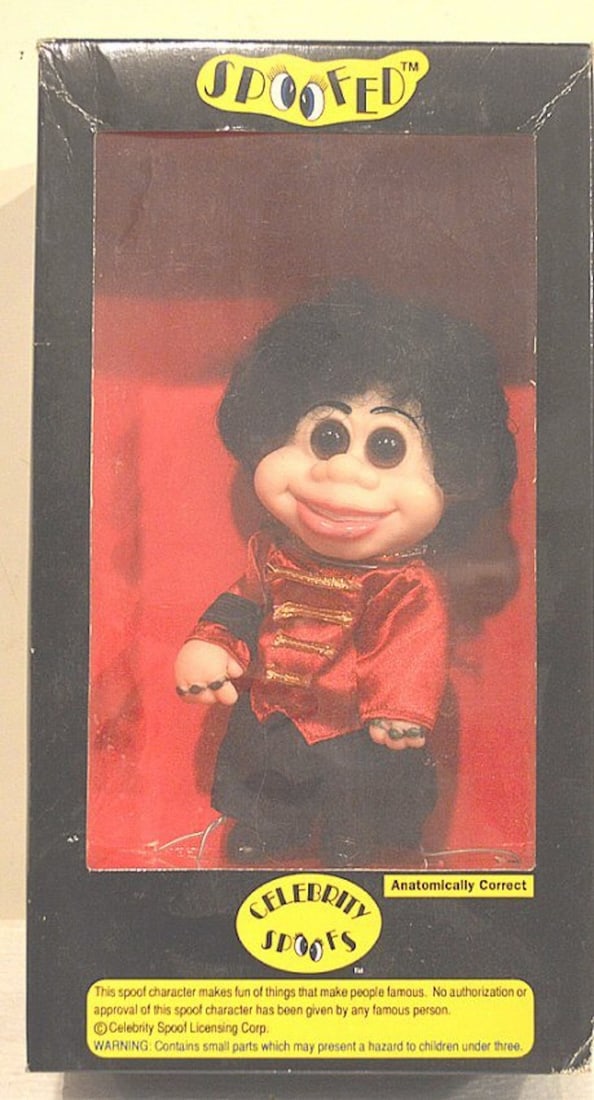 MICHAEL JACKSON CELEBRITY SPOOFS COMEDY DOLL: MICHAEL JACKSON CELEBRITY SPOOFS COMEDY DOLL. THIS SPOOF CHARACTER MAKES FUN OF THINGS THAT MAKE PEOPLE FAMOUS. MEASURES AT ABOUT 5" TALL.MINT IN BOX. COMPLETE AND INTACT. BOX SHOWS SOME SHELF WEAR