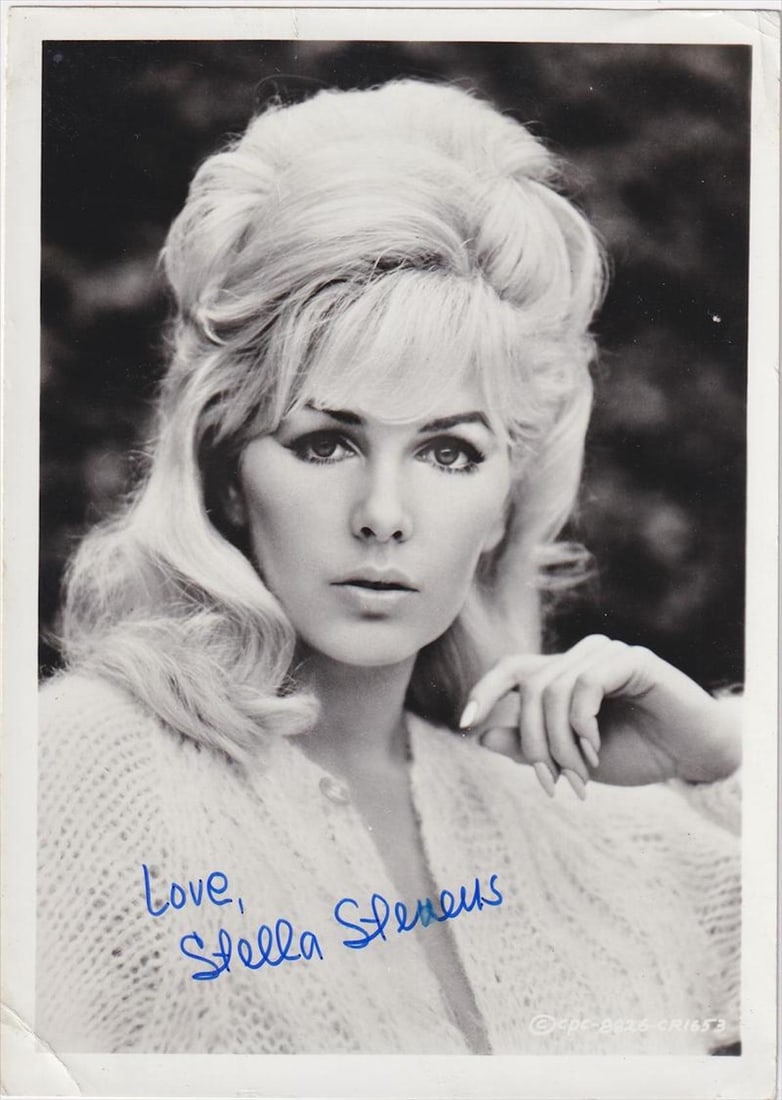 Stella Stevens - Signed 5 x 7 Photograph w/COA: Stella Stevens - Signed 5 x 7 Photograph w/COA. A black and white glossy photograph signed in blue felt tip ink by Stella Stevens. Bending in the photograph and wear in the corners, but otherwise in f