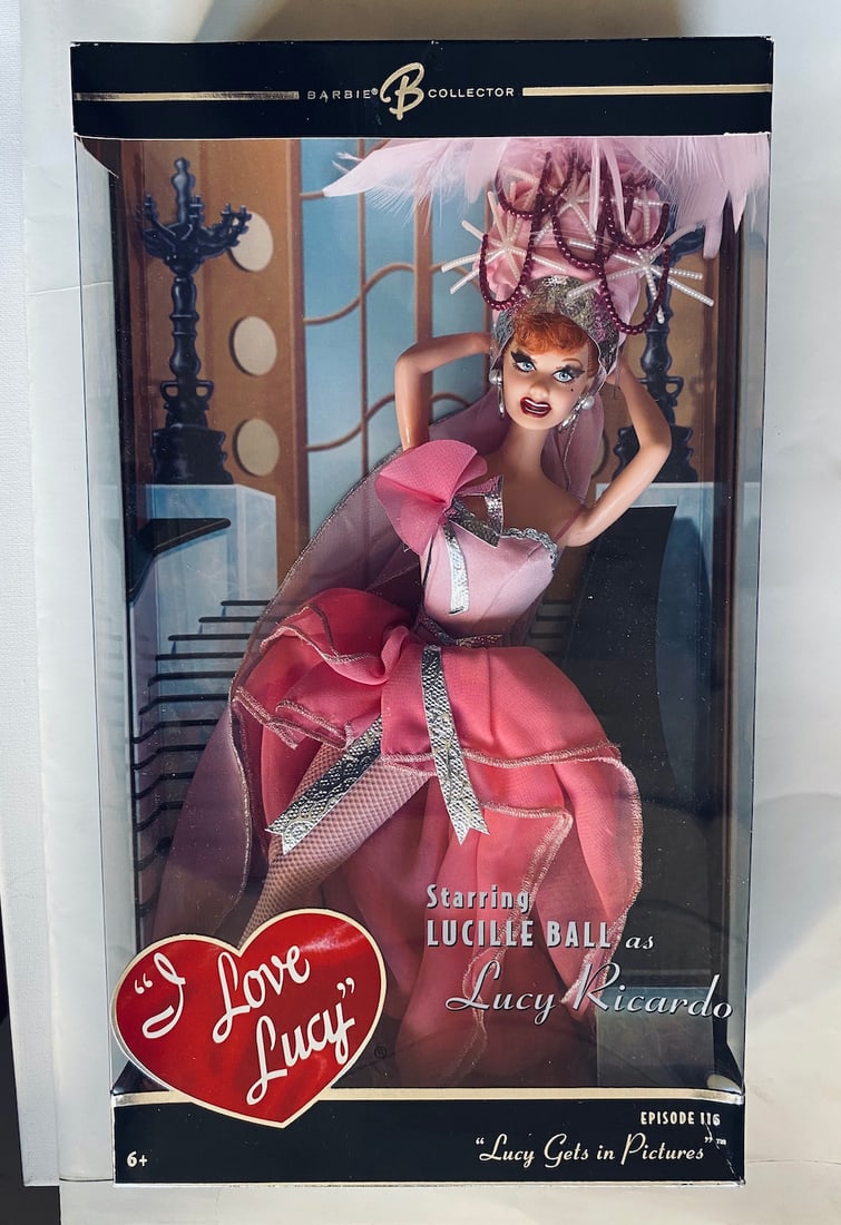 I Love Lucy "Lucy Gets in Pictures" Barbie Doll: I Love Lucy "Lucy Gets in Pictures" Barbie Doll. From Episode 116 "Lucy Gets in Pictures." New. Complete and intact. (Box 5)