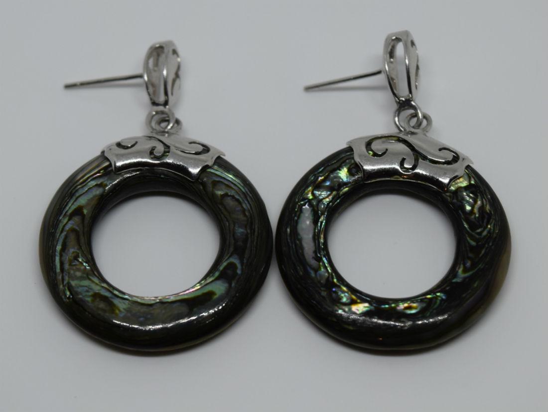 Sterling Silver Abalone Circle Earrings: These earrings have a 1.80” drop and are 1.18” round. They are post backs and weigh 11.25 grams. They are stamped and tested to be 925 sterling silver.