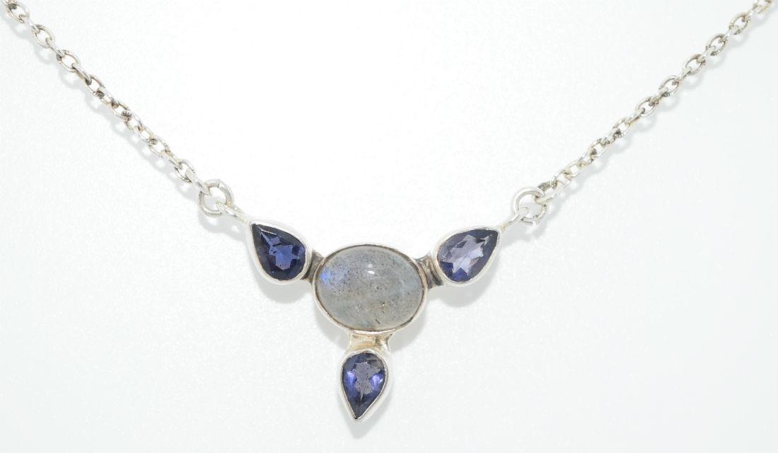 Sterling Silver Moonstone & Amethyst Necklace: Sterling silver moonstone & amethyst necklace. Moonstone encourages feminine power and mystery. Amethyst protects against negative energy and helps to break bad habits. Amethyst is the birthstone for 