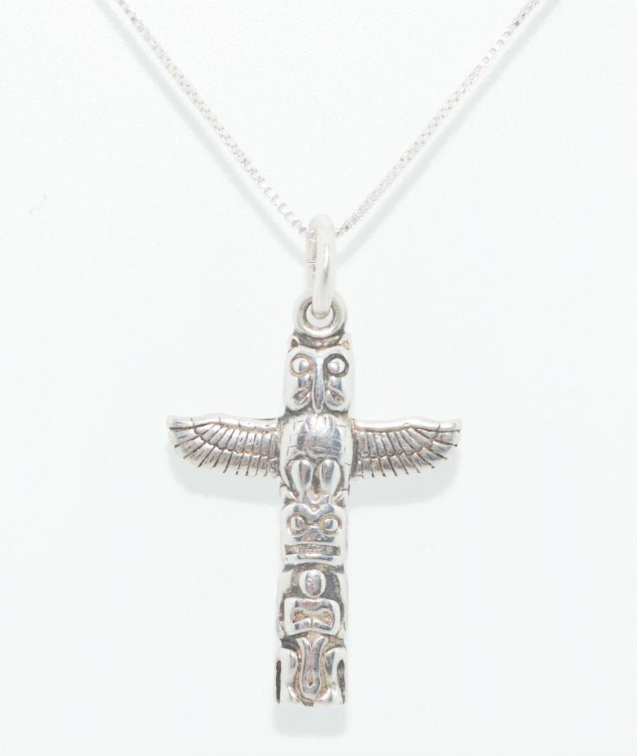 Native American Sterling Silver Totem Pole Necklace: Native American sterling silver totem pole pendant necklace | Measurement: 18” long 0.6mm thick necklace 1.3” pendant drop 0.8” wide | Weight: 3.7 grams | Stamp: 925 Italy