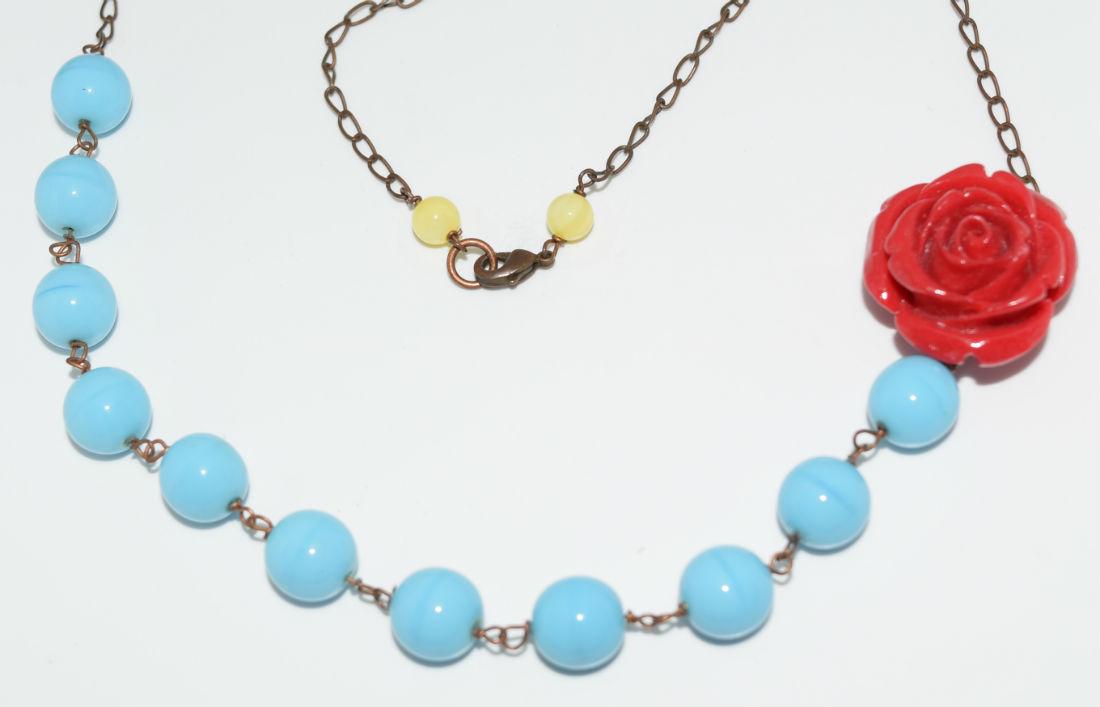 Red Rose Turquoise Color Bead Copper Tone Necklace: Red carved acrylic rose with turquoise color beads on a copper tone chain necklace with 2 yellow beads before the clasp | Measurement: 18" long, 2mm wide chain, 9.7mm beads, 23mm - 25mm rose