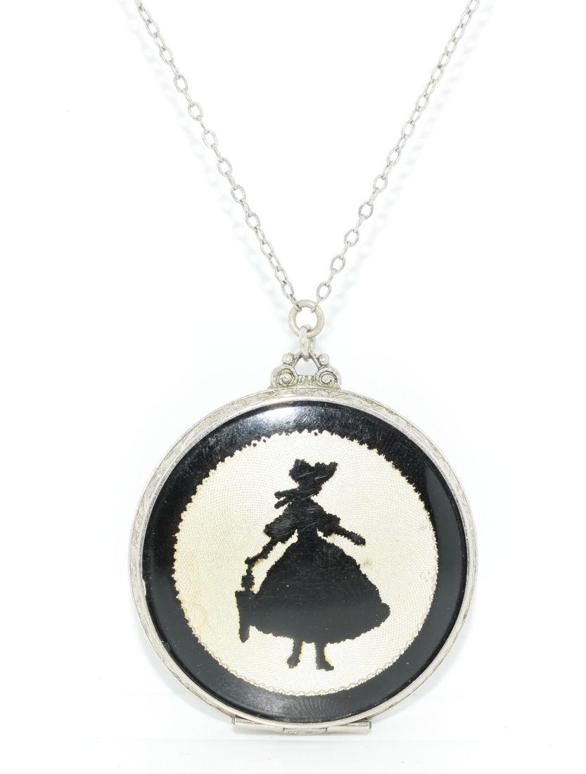 Silver Tone Enamel Locket Pendant Necklace: Enamel locket pendant with silver tone chain necklace without a clasp Note: there are scratches on the back of the locket | Measurement: 25" long 1.5" thick, 1.7" pendant