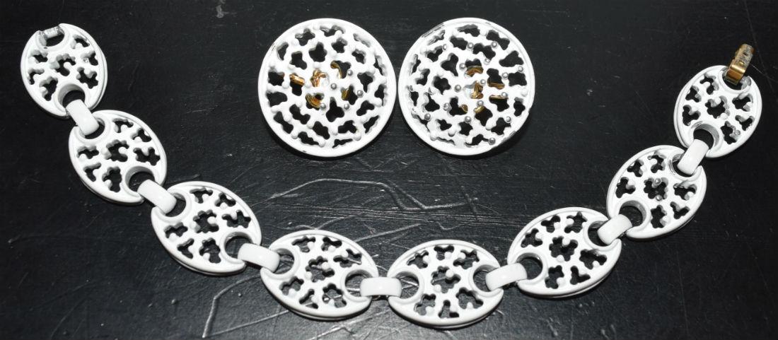 Designer Fashion Clip-on Earrings & Bracelet Set: Crown Trifari white enamel clip-on earrings and matching bracelet. Note: these earrings are missing some enamel on the front. | Measurement: 1" circumference earring, 7" long 15.7mm width bracelet