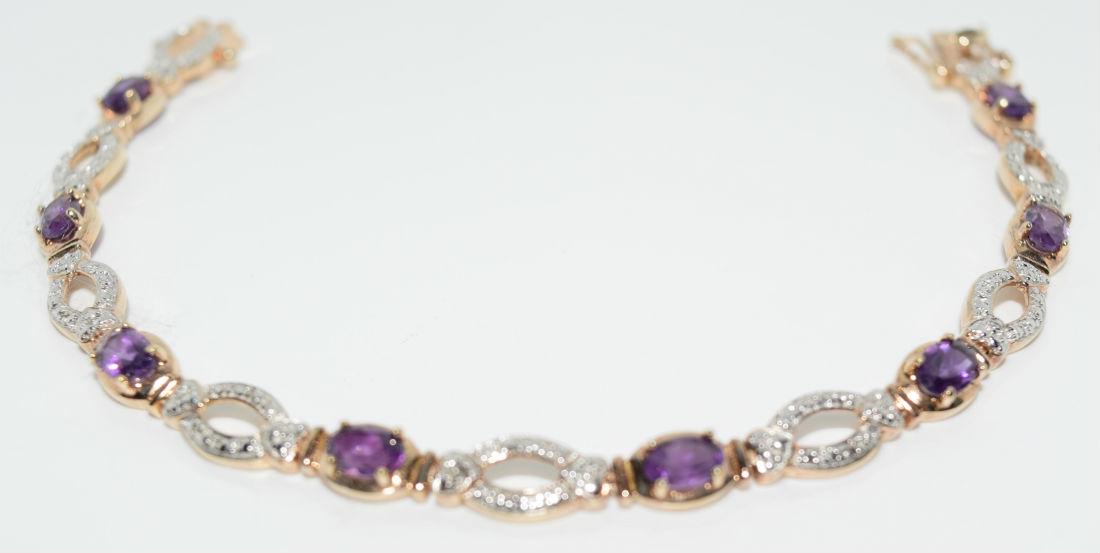 Gold Over Sterling Silver Amethyst Tennis Bracelet: Gold over sterling silver amethyst tennis bracelet | Measurement: 7.5" length 6.5mm width | Weight: 10.5 grams | Stamp: 925