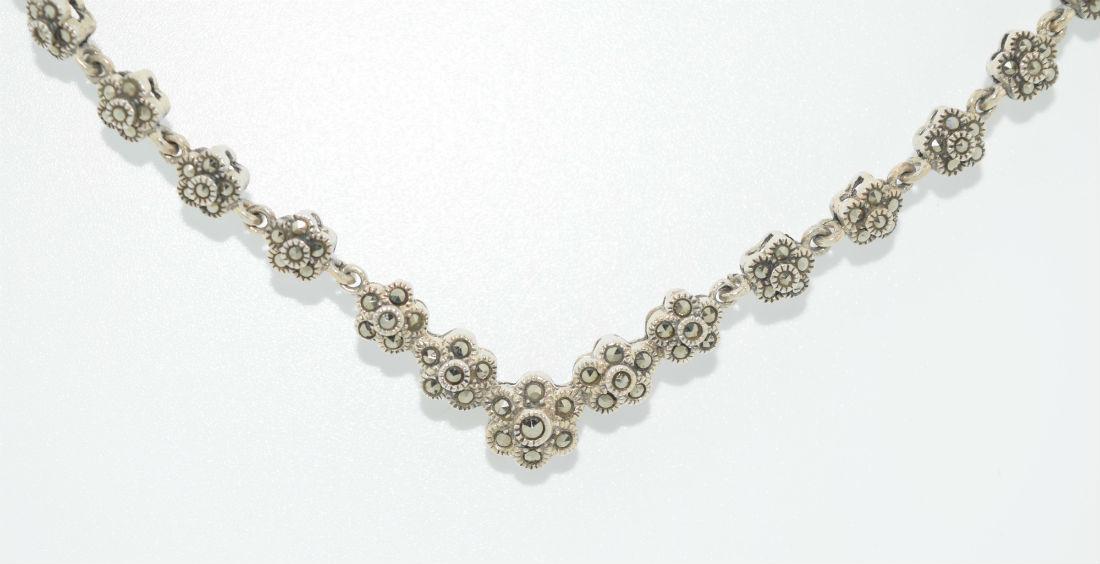 Sterling Silver Marcasite Flower Link Necklace: Sterling silver marcasite flower link necklace | Measurement: 14" length 5mm - 8mm graduated width