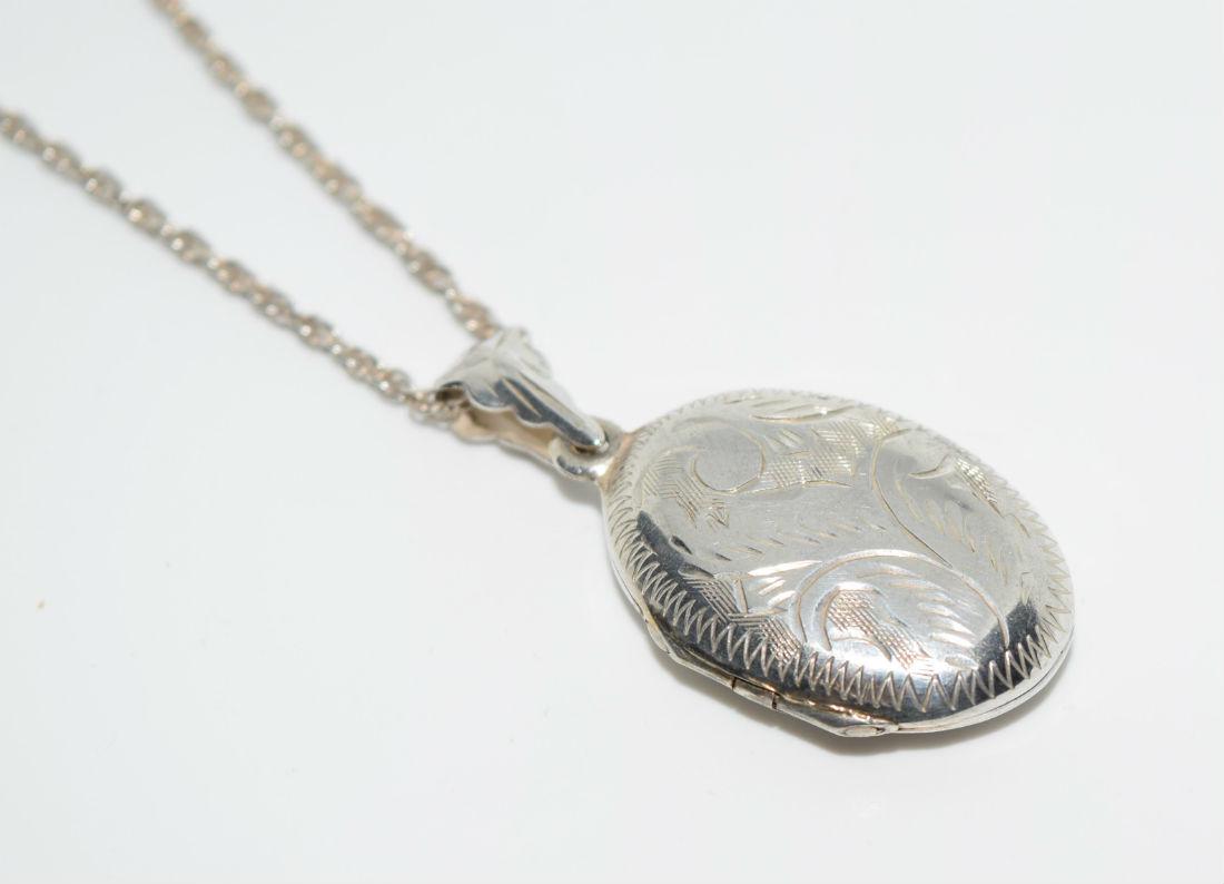 Sterling Silver Etched Locket Pendant Necklace: Sterling silver etched locket pendant necklace | Measurement: 17" length, 1.5" pendant drop 0.7" width