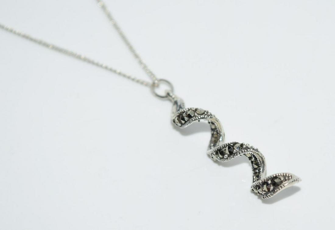 Sterling Silver Twisted Marcasite Pendant Necklace: Sterling silver twisted marcasite pendant necklace | Measurement: 20" length necklace, 1.3" pendant drop