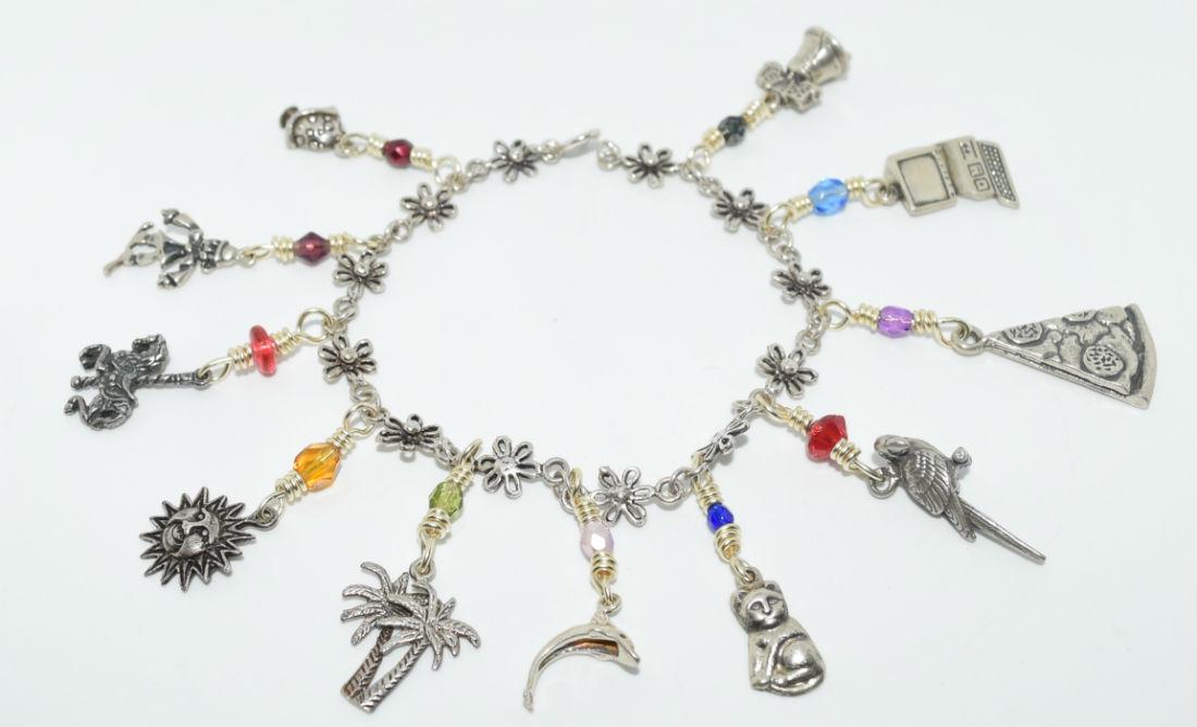 Vintage Sterling Silver Flowered Charm Bracelet (1 of 3)