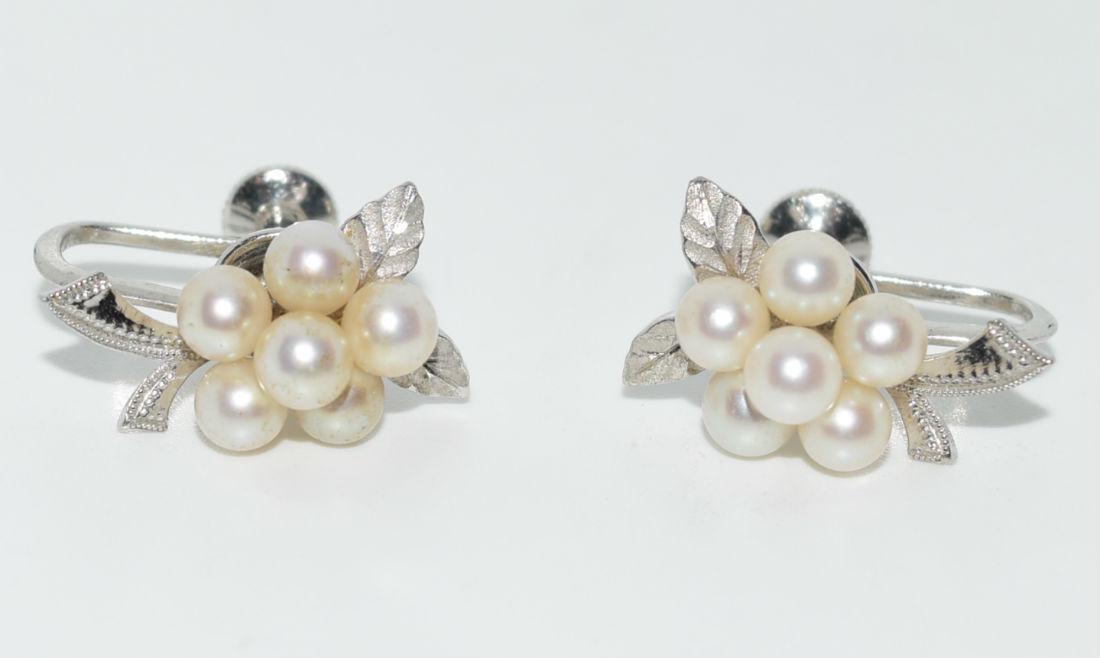 Vtg Sterling Real Pearl Cluster Screw-Back Earrings: These earrings have a 17mm drop and are 11mm wide. The pearls are 4mm rounds and each earring has 6. Stamped Silver