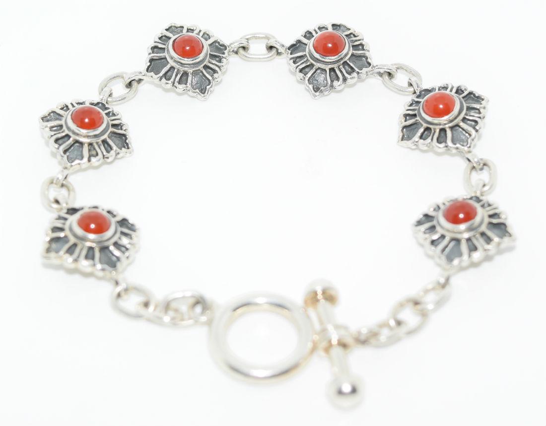Sterling Silver Cabochon Carnelian Toggle Bracelet: This bracelet weighs an impressive 22.6 grams and is 7.5” long. All links and ends are finely soldered together to help ensure the bracelet will not come detached. This speaks for the quality of thi