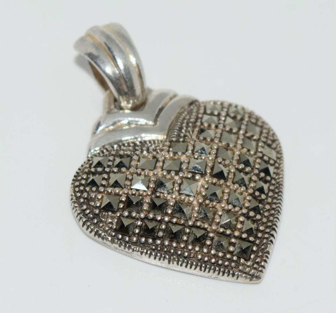 Sterling Silver Marcasite Heart Pendant: This pendant has a 37mm drop and is 27mm wide. Stamped 925, SU