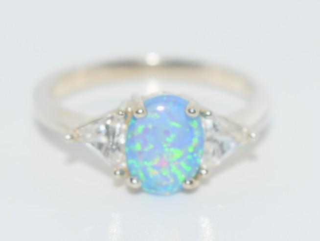 Vintage Sterling Faux Opal Avon Ring sz 6: This ring has an 8x14.5mm face and is a size 6. Stamped Avon, 925