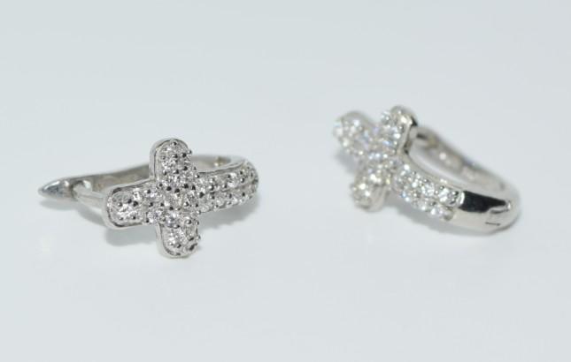 Sterling Silver Cross with Stones Huggie Earrings: Sterling Silver 2.17 Grams inlaid stone 8mm wide with a 14mm Drop huggie style hinged earrings