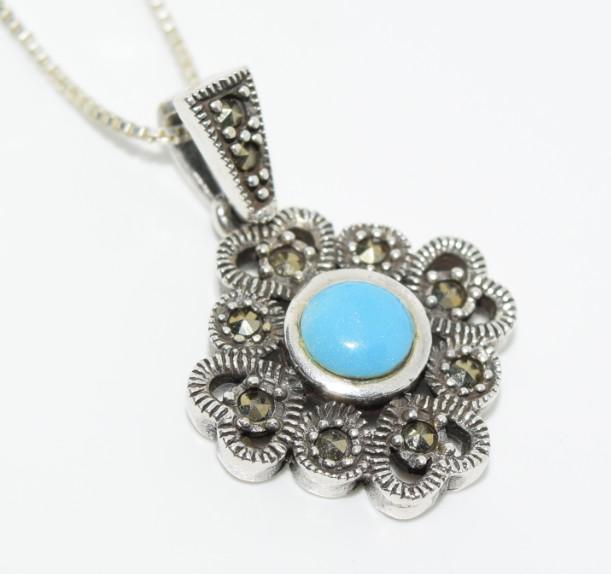 Sterling Turquoise & Marcasite Pendant Necklace: Sterling Silver Turquoise and Marcasite 18.5mm wide with a 27.1mm drop Pendant on .8mm 18” Box Chain weighing 5.87 Grams