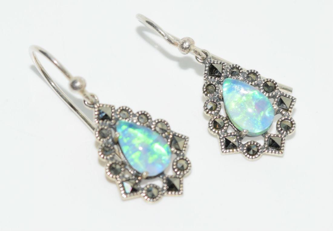 Sterling Silver Fire Opal Tear Drop & Marcasite Hook: Sterling Silver Fire Opal Measures 5.5mm x 8.7mm, Earrings Measure 13mm wide with a 30mm Drop