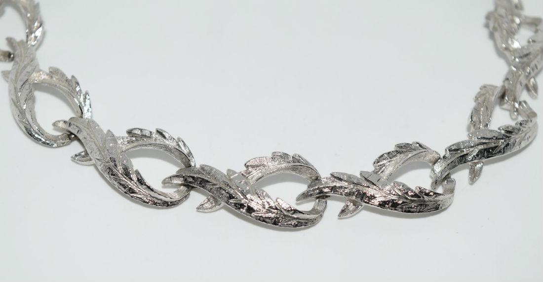 Vintage Monet silver tone etched leaf necklace: Vintage Monet silver tone etched leaf link necklace | Measurement: 13.5” â€“ 16” length 14.5mm width