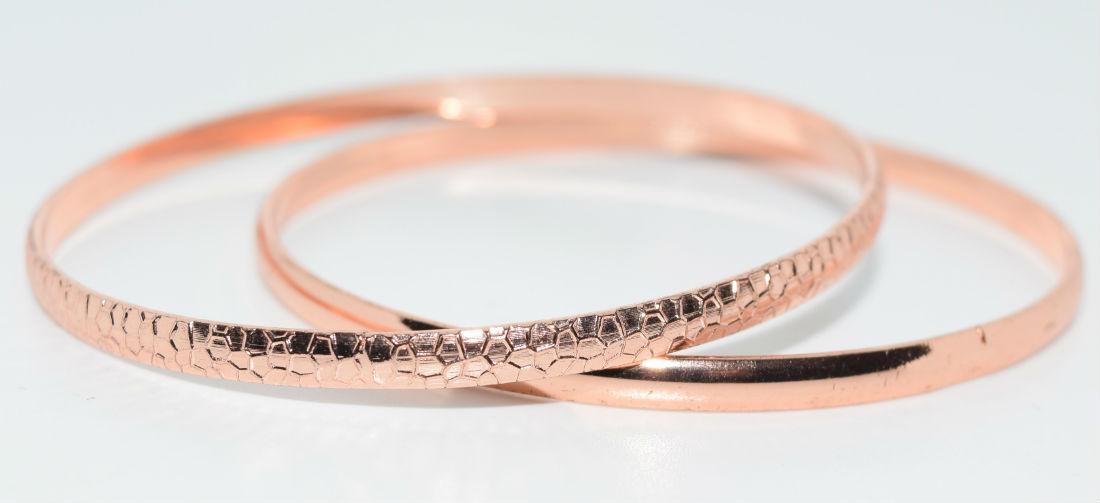 Set of 2 rose gold tone bangle bracelets (1 of 2)