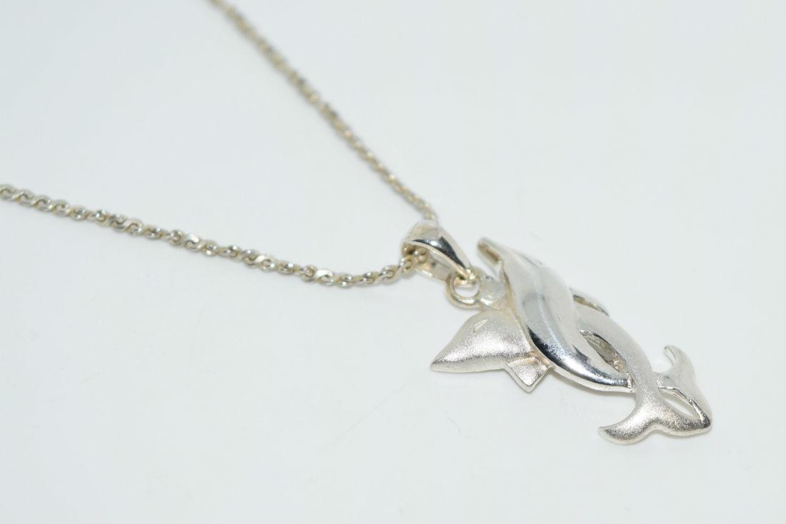 Sterling Silver Dolphin Pendant Necklace: Sterling silver double twisted dolphin necklace | Measurement: 17” length, 1.1” pendant drop