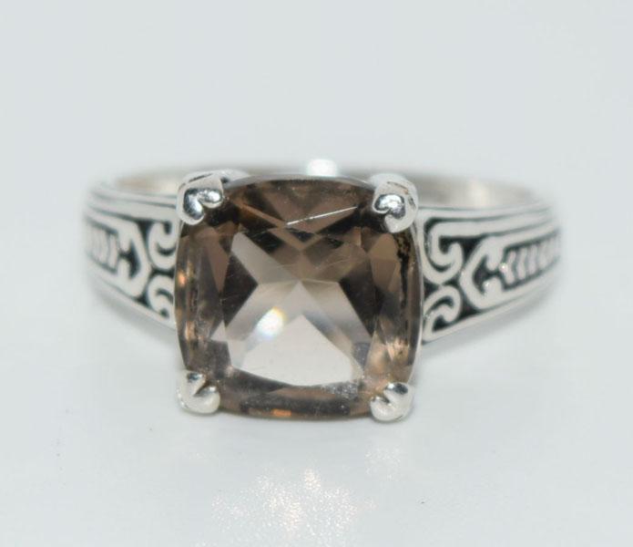 VTG Etched Silver Champaign Spinel Ring: This Sterling Silver etched side design ring is a size 7 and has a 10mm Champaign Color Cushion Cut Spinel stone and is stamped 925 A.